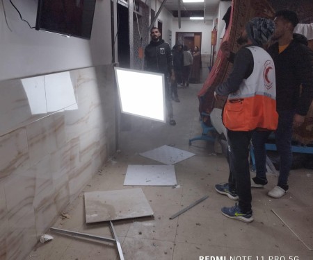 The Palestine Red Crescent Society condemns the targeting of its branch in Khan Younis by Israeli snipers today and the continuation of the siege of Al-Amal Hospital and the headquarters of the Society there for the twelfth consecutive day